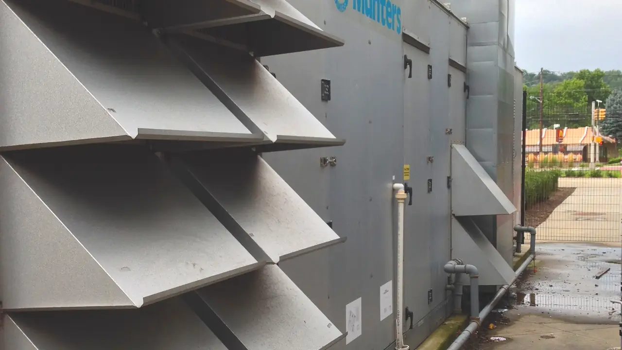 Industrial drying equipment outside a commercial building